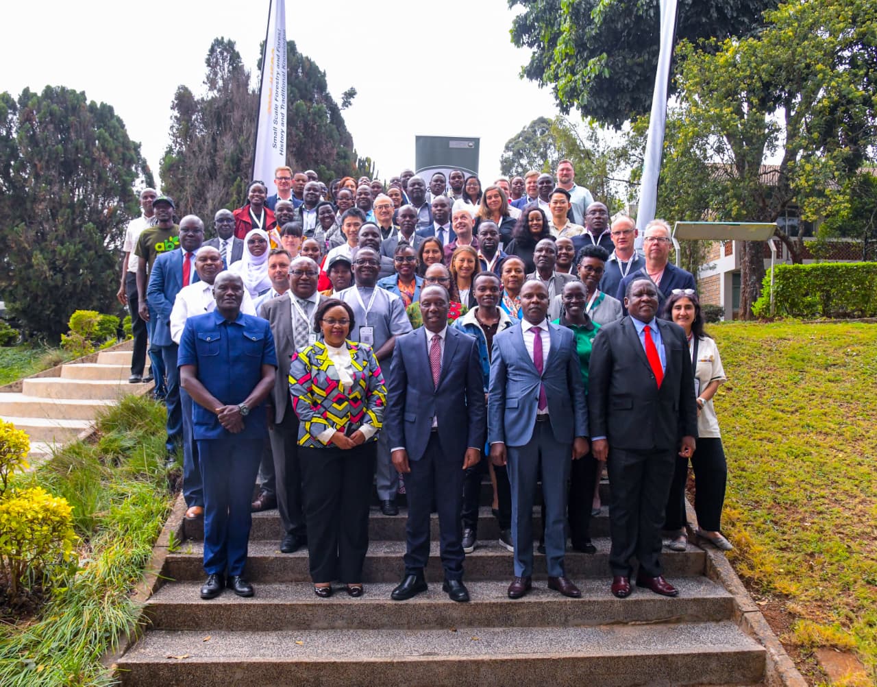 Forestry PS Mr. Gitonga Mugambi, KEFRI CEO Dr. Jane Njuguna, Secretary Forest Development George Tarus and Secretary Administration Patrick Meso lead delegates in a group photo at KEFRI headquarters Muguga as the 2026 IUFRO Joint Conference officially opens..