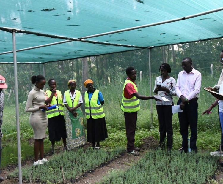 Officials from the state department and Bungoma community members during a onsite engagement.